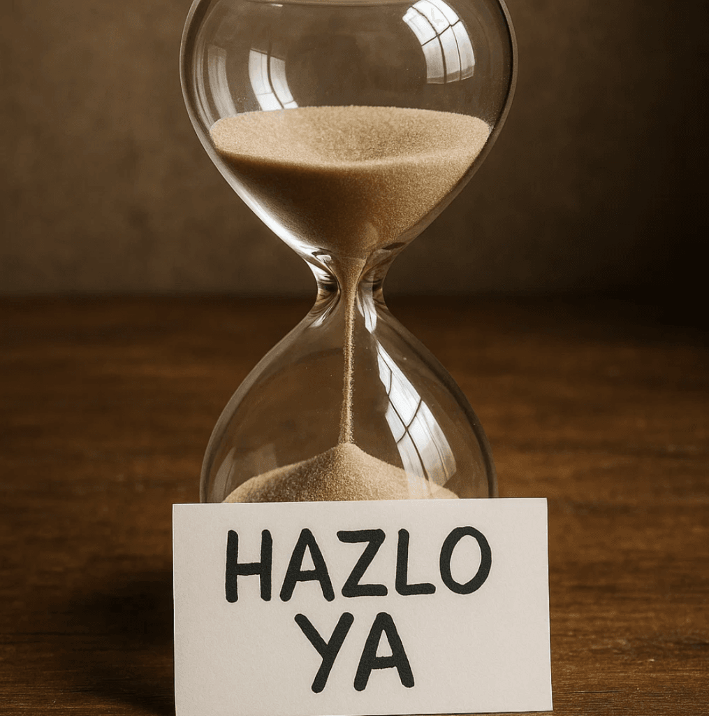 Reloj de arena con cartel que dice “Hazlo ya”.